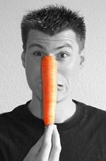 muž a mrkev - carrots - photo by ischerer, www.sxc.hu